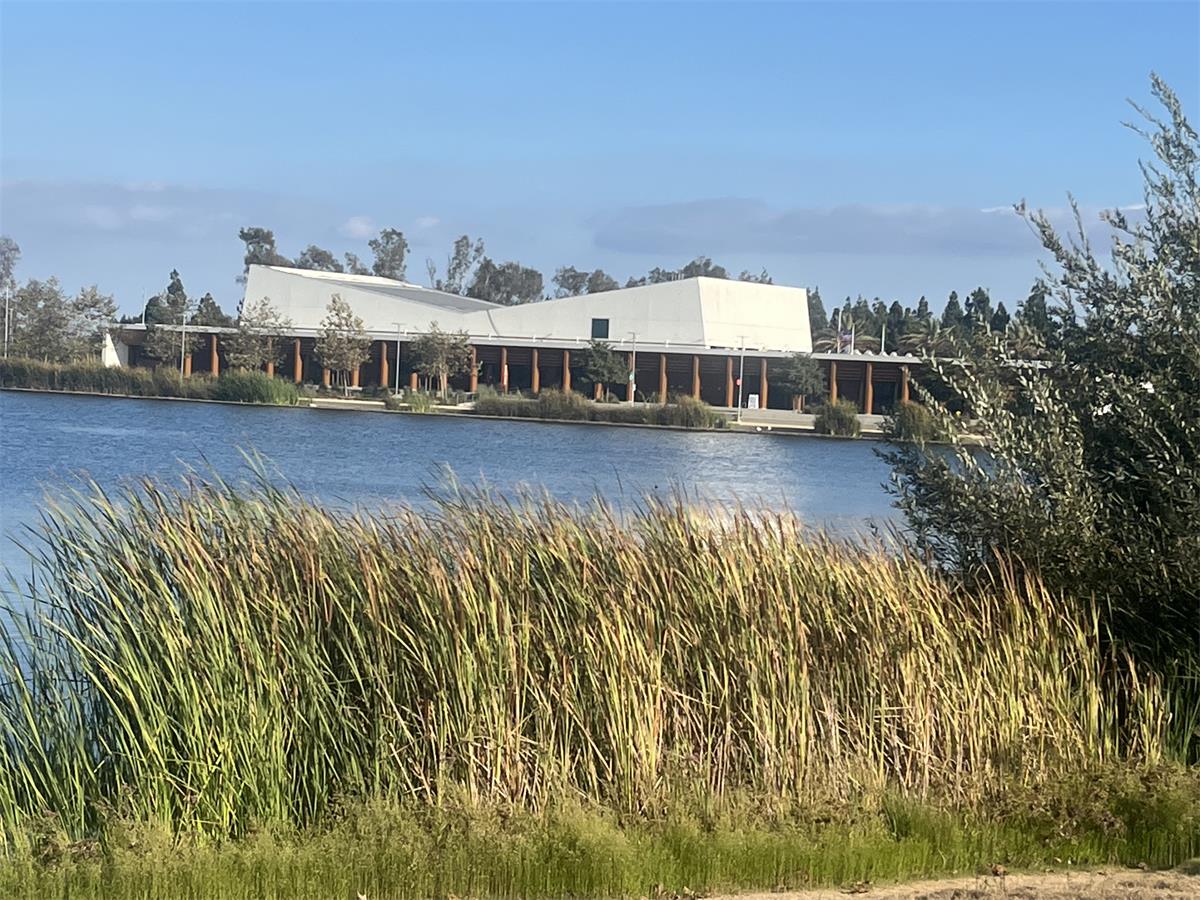 A view of the lake, with the new community center in the background.